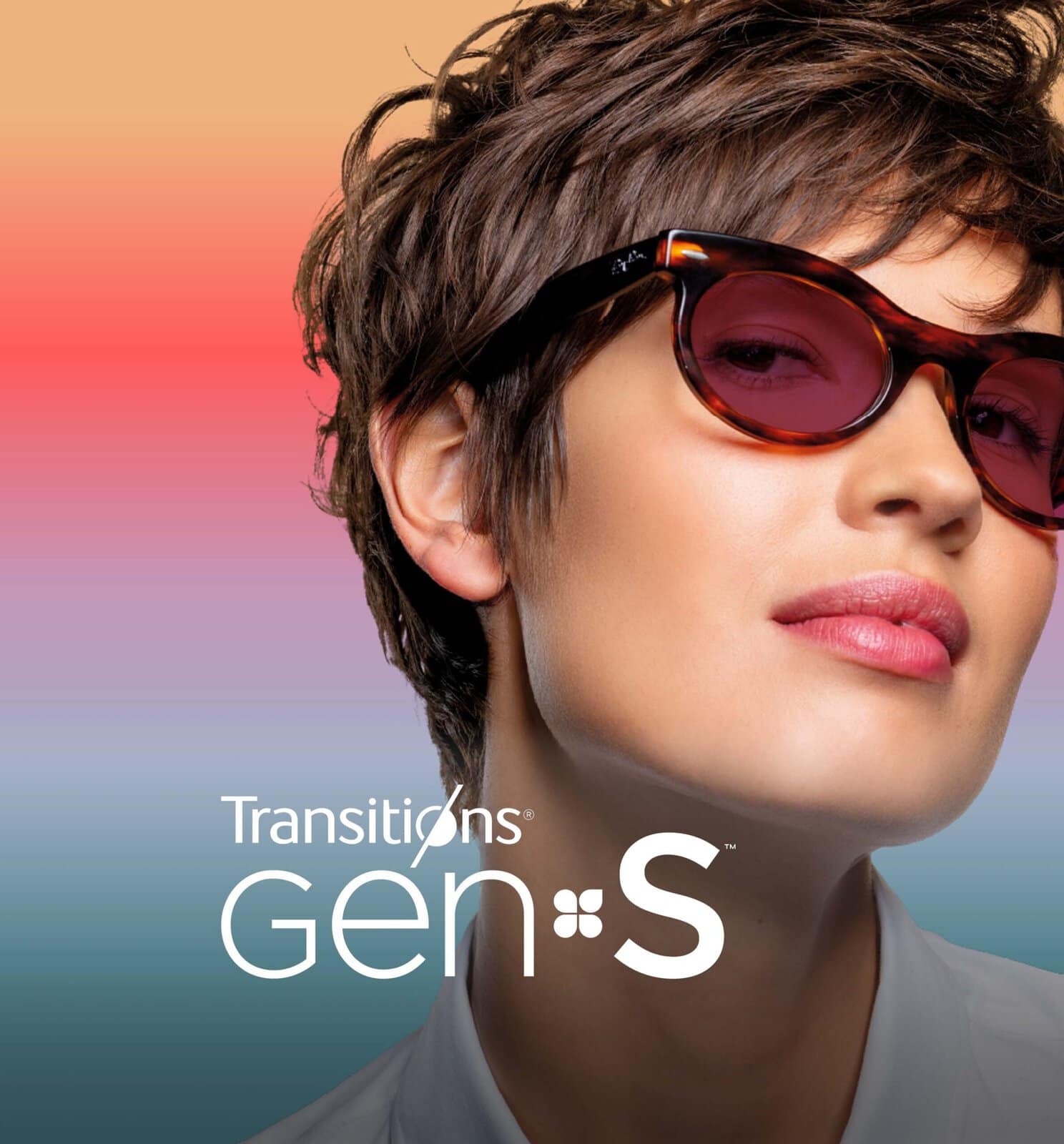 Woman wearing glasses with Transitions GEN S ruby-coloured lenses